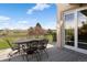 Spacious deck with wrought iron furniture, ideal for entertaining with picturesque views at 4373 E Phillips Pl, Centennial, CO 80122