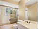 Bathroom featuring shower-tub combo and a single vanity at 9004 E Floyd Ave, Denver, CO 80231