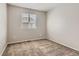 Carpeted bedroom with window for comfort at 2229 Hyacinth Rd, Highlands Ranch, CO 80129
