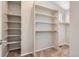 Bright closet features open shelving and a wooden clothing rod at 2229 Hyacinth Rd, Highlands Ranch, CO 80129