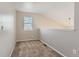 Spacious hallway with carpet and natural lighting at 2229 Hyacinth Rd, Highlands Ranch, CO 80129