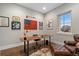 Home office with a live-edge wood desk and leather chair at 1465 Davis Ct, Erie, CO 80516