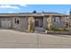 Charming single-story home with a well-maintained front yard and attached garage at 4750 E Louisiana Ave, Denver, CO 80246