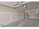Spacious unfinished garage with concrete floor and ample storage potential at 4750 E Louisiana Ave, Denver, CO 80246