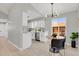 Bright kitchen features white shaker cabinets, stainless steel appliances, and quartz countertops at 4750 E Louisiana Ave, Denver, CO 80246