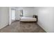Bright and airy bedroom with access to balcony and carpet flooring at 14780 E Kentucky Dr # 414, Aurora, CO 80012