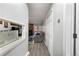 Hallway view of living room with fireplace and access to bedroom at 14780 E Kentucky Dr # 414, Aurora, CO 80012