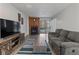 Spacious living room with fireplace and sliding door access to patio at 14780 E Kentucky Dr # 414, Aurora, CO 80012