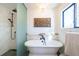 Modern bathroom showcases a freestanding tub and stylish glass shower at 2231 Meadow Green Cir, Franktown, CO 80116