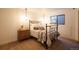 Bright bedroom featuring natural light, neutral decor, and comfortable furniture at 2231 Meadow Green Cir, Franktown, CO 80116