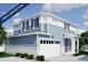 New two-story home featuring a two-car garage and charming exterior design at 22343 E 38Th Pl, Aurora, CO 80019
