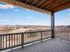 Relaxing balcony showcasing scenic views of the surrounding landscape and nearby community at 730 Edenborn Pl, Castle Rock, CO 80104
