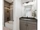 Bright bathroom with stylish vanity, modern fixtures, shower, and sleek finishes at 730 Edenborn Pl, Castle Rock, CO 80104