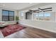 Spacious bonus room with large windows offering scenic views and ample natural light at 730 Edenborn Pl, Castle Rock, CO 80104