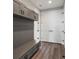 Well-organized mud room with custom bench, storage cabinets, and stylish design at 730 Edenborn Pl, Castle Rock, CO 80104