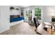 Bright spare bedroom with a trundle bed, bookcase, and an office area at 9632 W Chatfield Ave # C, Littleton, CO 80128
