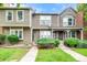 Inviting townhouse with well-manicured lawn and shrubbery, and classic siding at 9632 W Chatfield Ave # C, Littleton, CO 80128