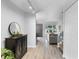 Bright foyer with hardwood floors, stylish accents, and an open layout, creating a welcoming entrance at 9632 W Chatfield Ave # C, Littleton, CO 80128