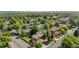 Overview of the condo complex with mature trees, manicured lawns, and convenient street parking at 9587 W 89Th Cir, Broomfield, CO 80021