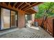 Private patio with sliding door access and exterior air conditioning unit at 9587 W 89Th Cir, Broomfield, CO 80021
