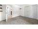 Bedroom showcasing plush carpeting and closet, with a doorway view into other rooms at 9587 W 89Th Cir, Broomfield, CO 80021