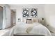 Cozy bedroom featuring neutral decor, plush carpeting, and natural light at 9587 W 89Th Cir, Broomfield, CO 80021