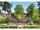 Two-story townhome with beautiful landscaping and double staircases at 9587 W 89Th Cir, Broomfield, CO 80021