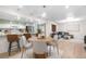Open living space connects the kitchen, dining, and living areas, creating a warm and inviting atmosphere at 9587 W 89Th Cir, Broomfield, CO 80021
