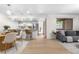 Bright, open living space combines dining, kitchen, and living areas for easy interaction at 9587 W 89Th Cir, Broomfield, CO 80021