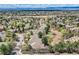 Scenic aerial view of the neighborhood with mature trees, spacious properties, and mountain views at 1 Silver Fox Dr, Greenwood Village, CO 80121