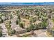 Picturesque aerial view of a lush neighborhood with mature trees, well-maintained homes, and community spaces at 1 Silver Fox Dr, Greenwood Village, CO 80121