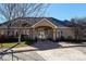 Attractive clubhouse exterior boasting a covered entrance, well-maintained landscaping, and ample natural light at 1 Silver Fox Dr, Greenwood Village, CO 80121