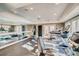 Well-equipped fitness center featuring modern treadmills, weight machines, and mirrored walls for workouts at 1 Silver Fox Dr, Greenwood Village, CO 80121