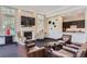 Comfortable lounge area with fireplace, TV, and kitchenette, perfect for relaxing and entertaining guests at 1 Silver Fox Dr, Greenwood Village, CO 80121