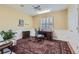 Home office featuring natural lighting, traditional desk and chair, and neutral wall color at 1 Silver Fox Dr, Greenwood Village, CO 80121