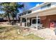 Spacious backyard featuring a patio with an outdoor dining set and a hot tub for ultimate relaxation at 13000 Willow Ln, Golden, CO 80401