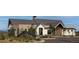 Beautiful stone and siding clubhouse with mountain views and well maintained landscaping at 332 Agoseris Way, Castle Rock, CO 80104