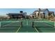 Community tennis and pickleball courts with professional nets and fencing at 332 Agoseris Way, Castle Rock, CO 80104