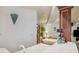 Basement bar area with tiled countertops and elegant decorative elements at 19595 E Top O The Moor Dr, Monument, CO 80132