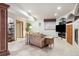 Basement living area with cozy seating, fireplace, and entertainment options at 19595 E Top O The Moor Dr, Monument, CO 80132