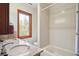 Bright bathroom with a double vanity and shower and tub combo, perfect for relaxing at 19595 E Top O The Moor Dr, Monument, CO 80132