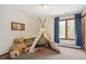 bedroom with hardwood flooring, natural light and space to play at 19595 E Top O The Moor Dr, Monument, CO 80132