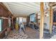 Enclosed work shop with tools and windows for natural light at 27407 Upper Cold Spg Gulch Rd, Golden, CO 80401
