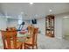 Finished basement features carpet, a treadmill, and a seating area at 6020 Quail St, Arvada, CO 80004