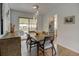 Open dining area leads to an outdoor space, perfect for seamless indoor-outdoor entertaining at 6020 Quail St, Arvada, CO 80004