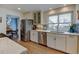 Bright kitchen featuring stainless steel appliances and easy access to the adjacent dining area at 6020 Quail St, Arvada, CO 80004