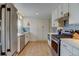 Efficient kitchen with stainless steel appliances, granite countertops, and ample storage at 6020 Quail St, Arvada, CO 80004