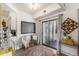 Casual dining area next to sliding glass doors for outdoor views and natural light at 7250 Eastmoor Dr # 203, Denver, CO 80237