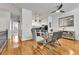 Bright dining area with modern furnishings and a view into the kitchen at 45 Jackson St # C, Denver, CO 80206