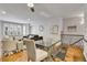 Cozy open concept dining space with hardwood flooring and kitchen access at 45 Jackson St # C, Denver, CO 80206